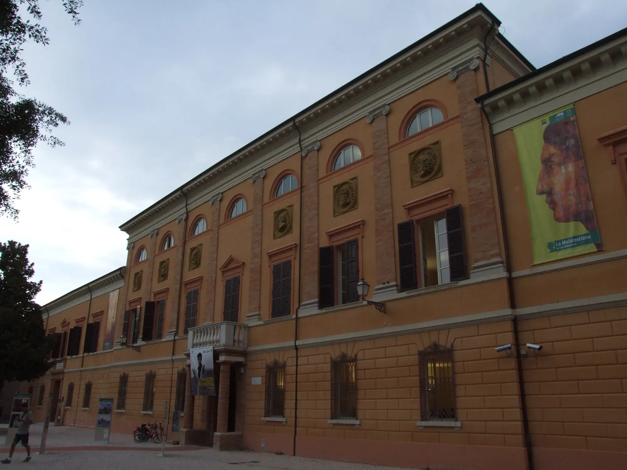 The ochre façade of the Biblioteca Malatestiana in Cesena